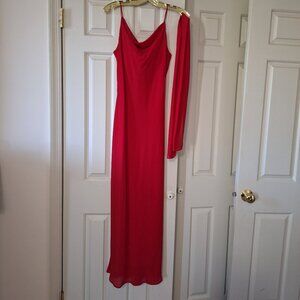 Red, floor-length sheath dress with beading